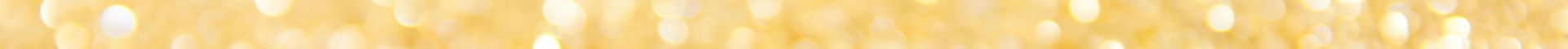 Abstract gold glitter background with a bokeh effect, ideal for festive designs.